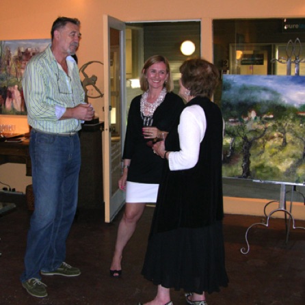 Gallery owner, Emir Bezdrob, with guests Gallery owner, Emir Bezdrob, with guests